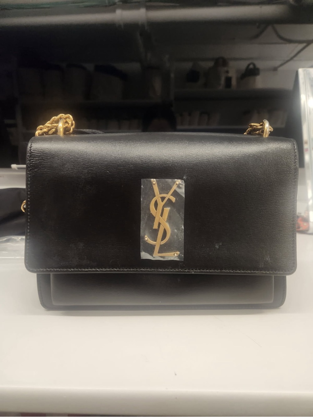 Saint Laurent Black Leather Shoulder Bag with Gold YSL Plaque